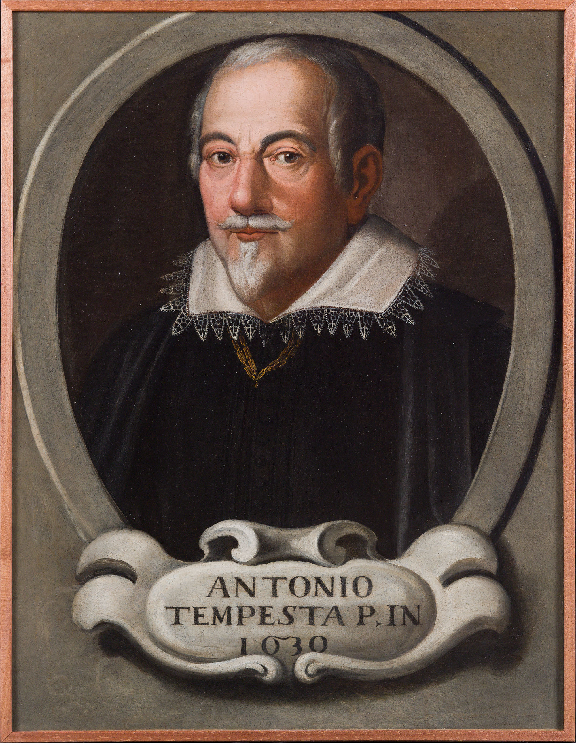 A paiting shows a man from the bust up, gazing directly at the viewer. He wears a black shirt and a golden necklace around a white embroidered collar. His figure is set within a medallion-like frame that appears inside the larger frame of the image. A cartouche is inscribed with “Antonio Tempesta P. In 1630.”